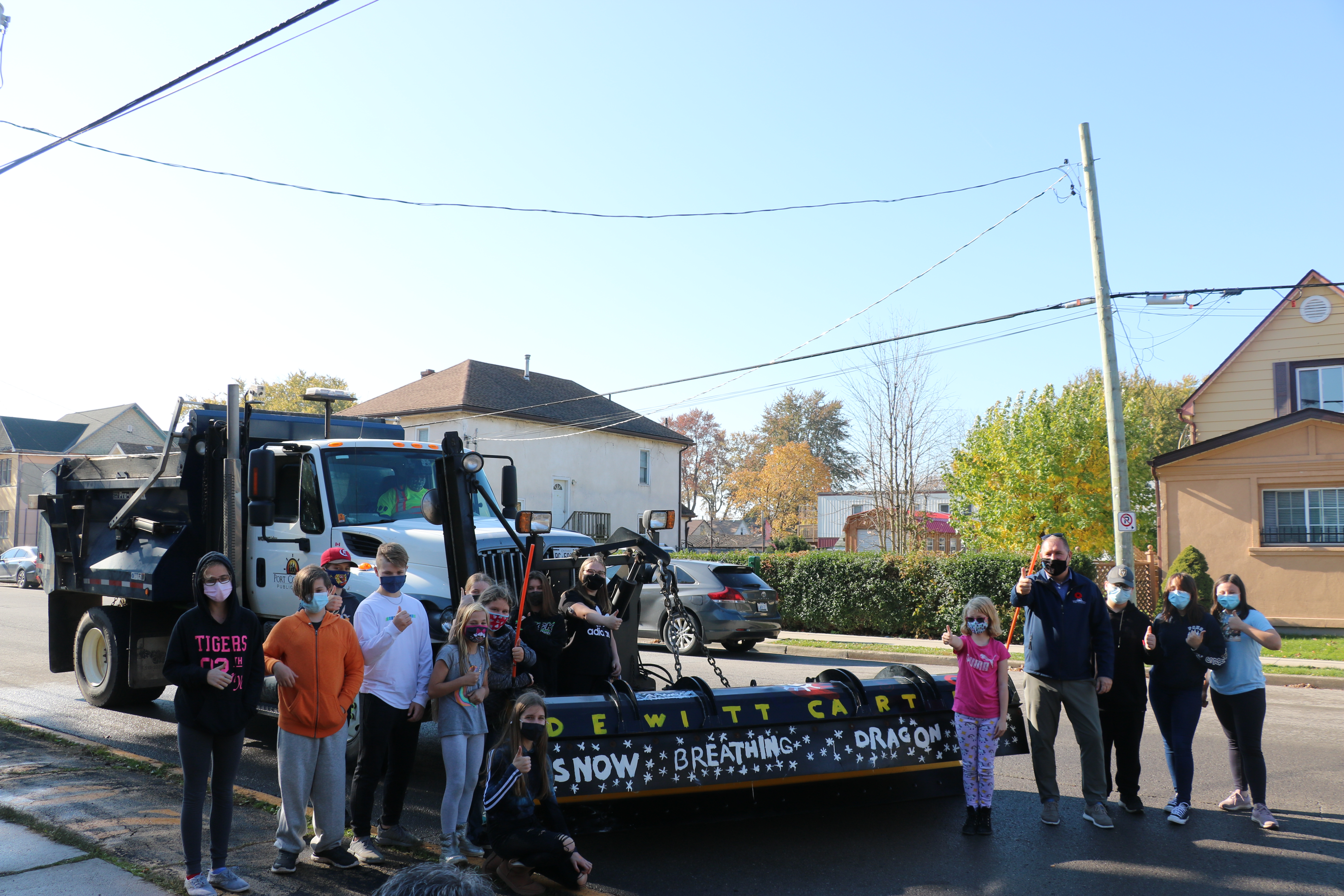 Students infront of snowplow