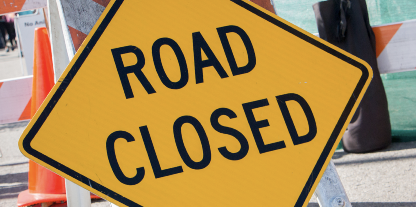 Up-close image of a road closure sign