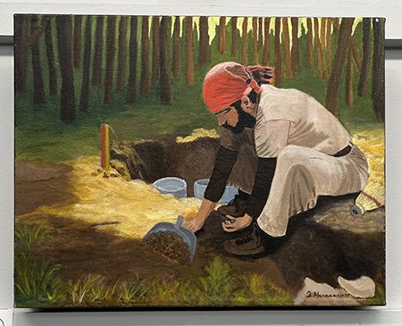 Painting of a man working in the earth on display