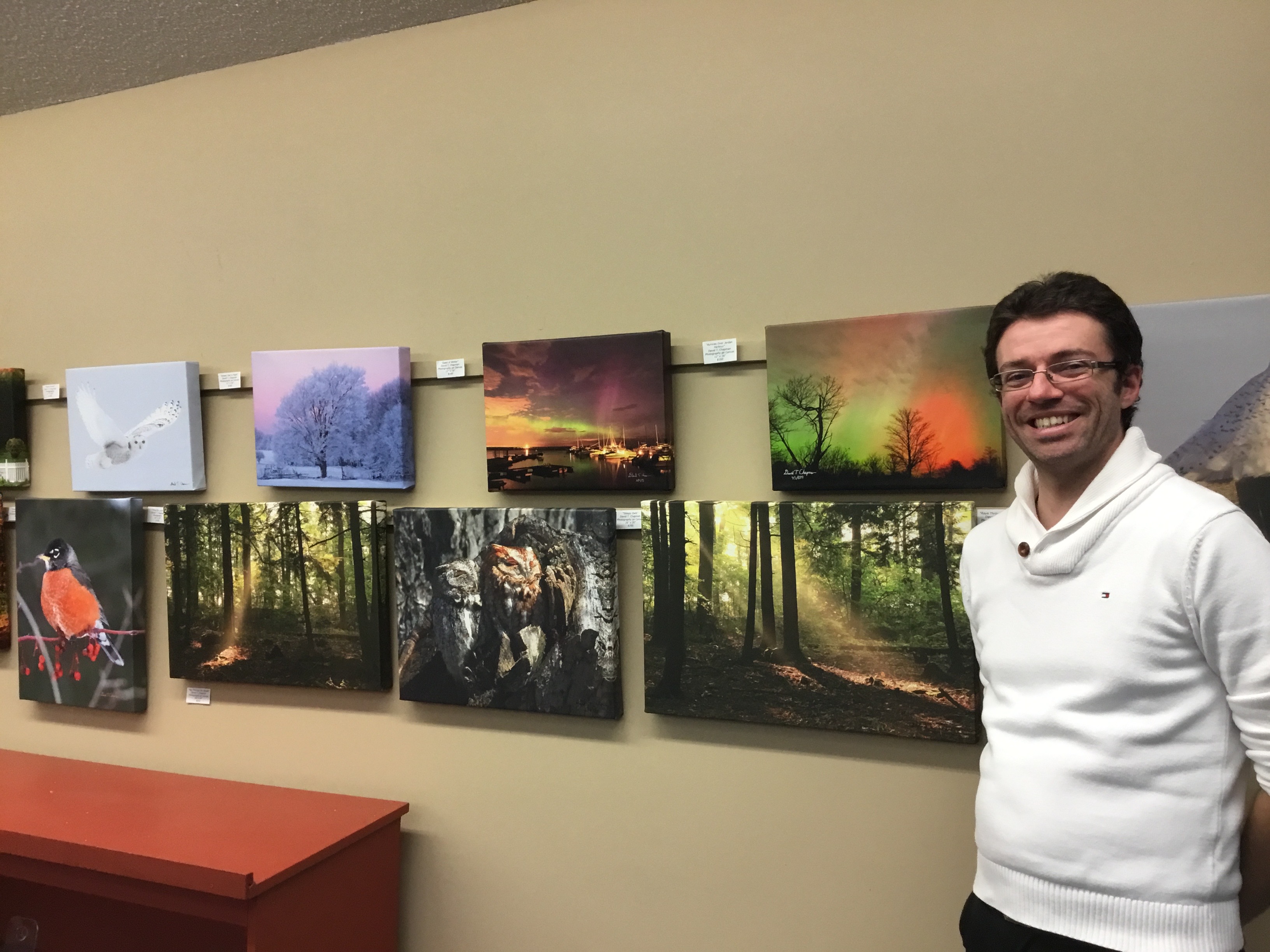 Photographer David T. Chapman with his nature, birds and weather display at the library 2017