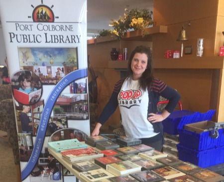 Librarian at Pop-Up Library in community