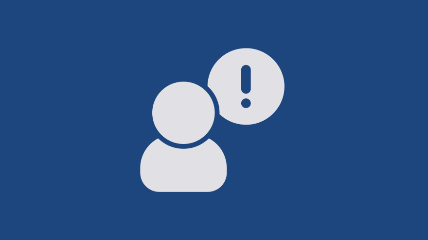 user with an exclamation mark in a speech bubble on a dark blue background.