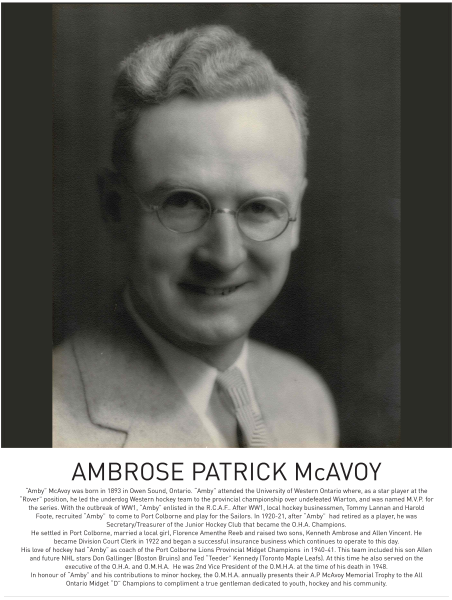 Black and white portrait of a smiling person with glasses and light-coloured hair.