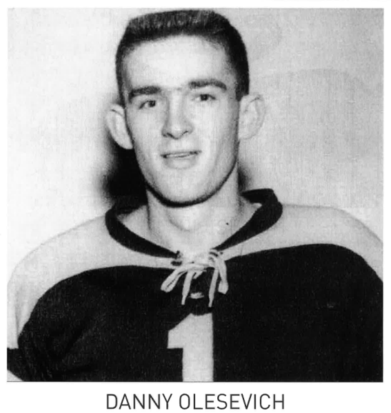 Black and white portrait of a young hockey player wearing a jersey with the number 1.