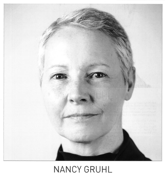 Black and white portrait featuring a person with short hair, neutral expression, and clear skin.