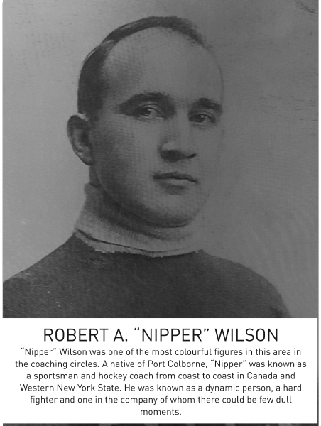 Black-and-white photograph of a man with a turtleneck sweater, looking directly at the camera.